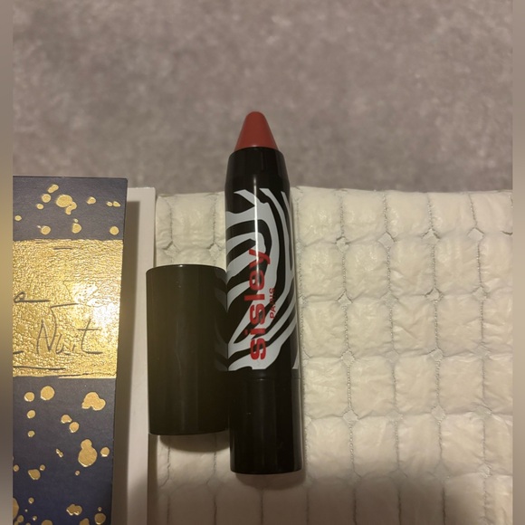 Sisley Lip Twist in color 15 Nut Izia la Nuit Makeup Bag - Picture 2 of 4